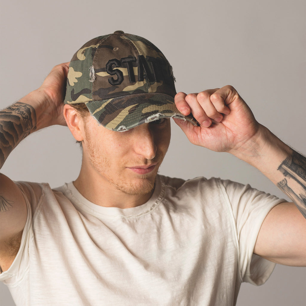 alt front view on model STATE Distressed Baseball Hat camo