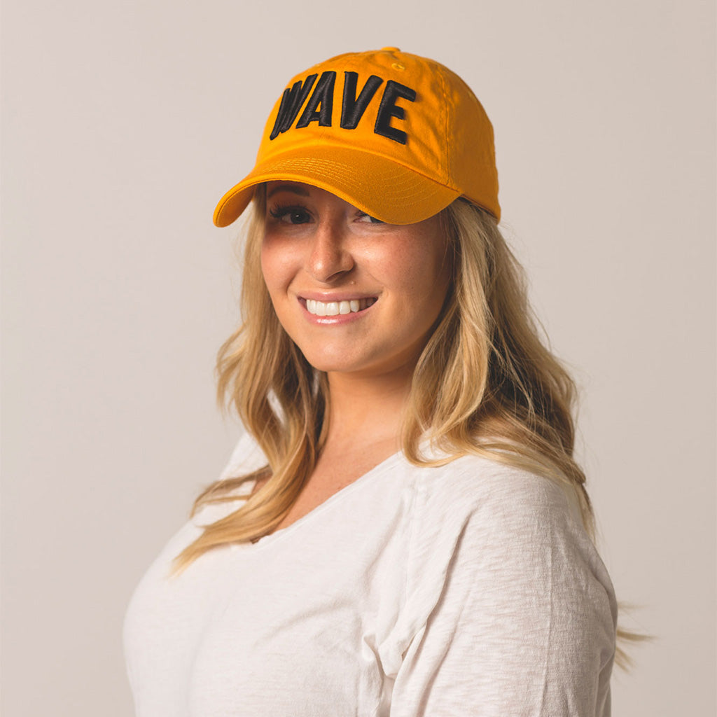 front view on model WAVE gold hat