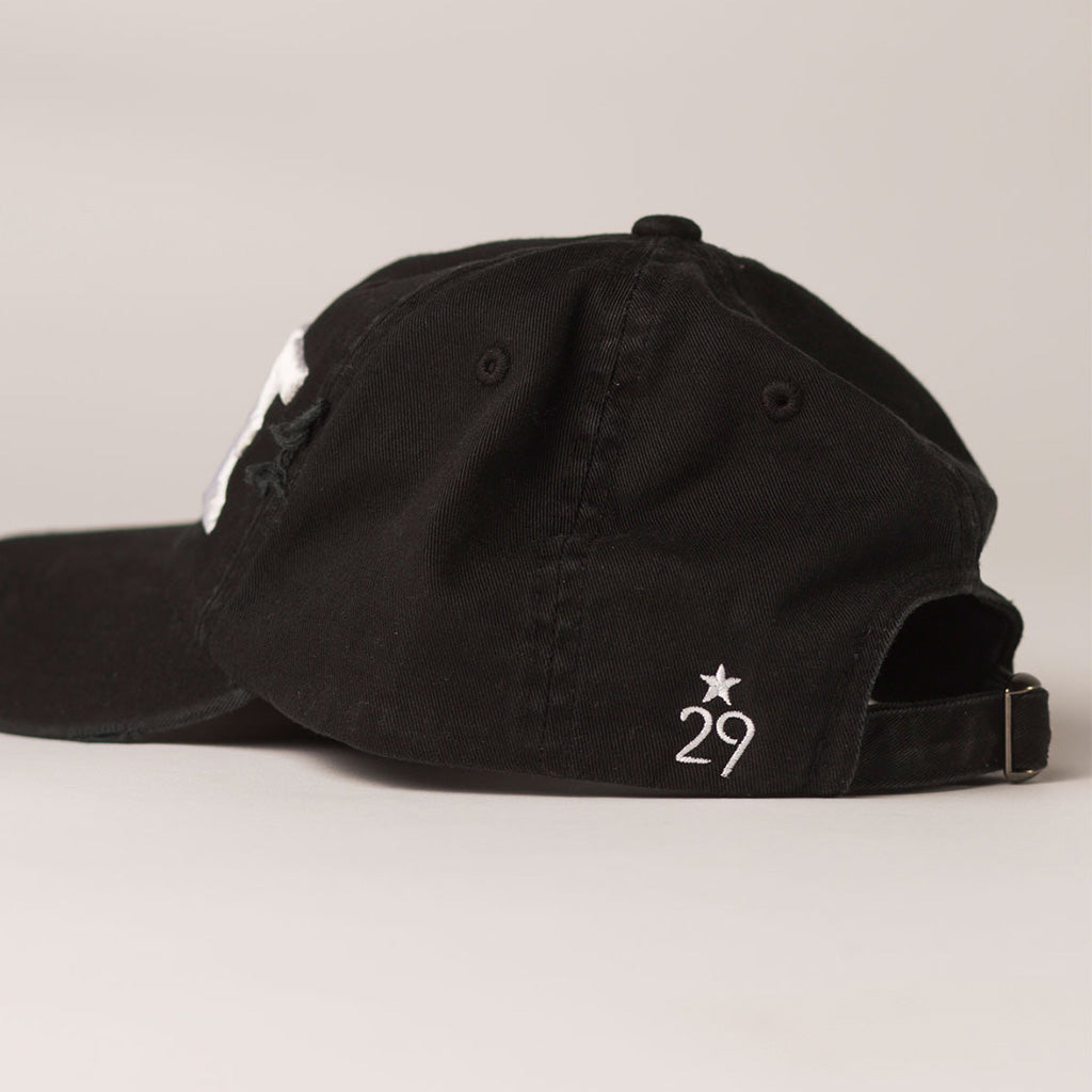 side view WAVE black distressed baseball hat